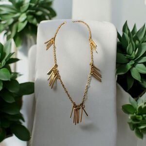 Gold toned 18-inch fringed necklace